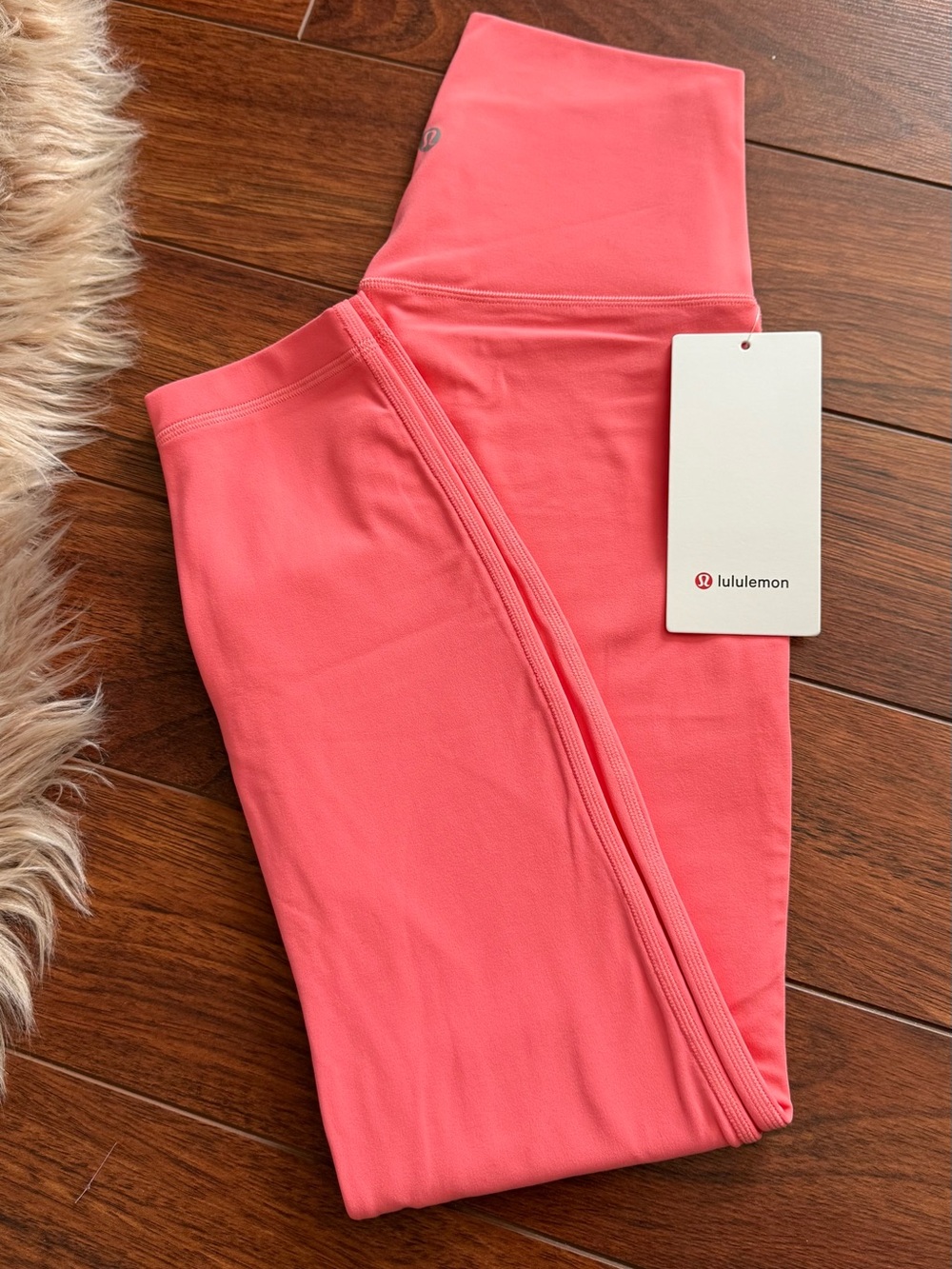 Lululemon Align High Rise 25" Leggings in Coral Pink size 6 
Brand new with tags